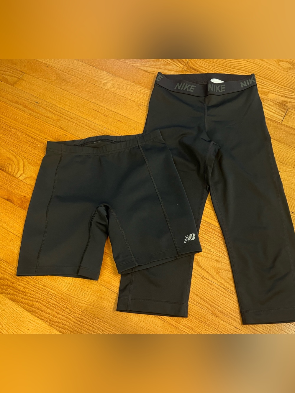 Nike Black Performance Capri Leggings & under armour compression shorts
